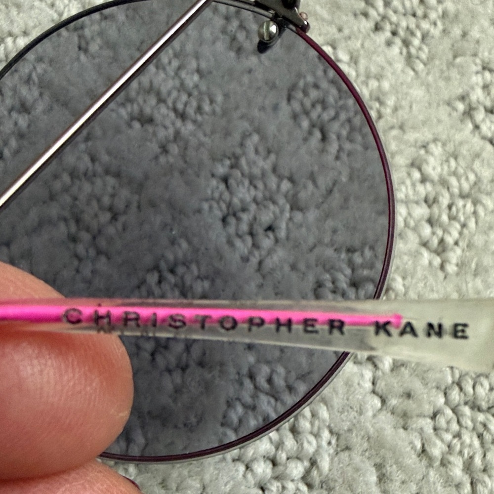 Christopher Kane Clear-Arm Round Sunglasses with Pink Trim